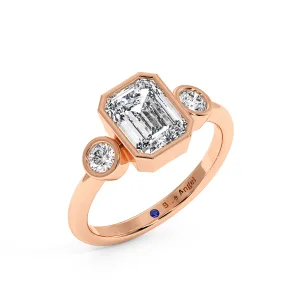 Emerald With Round Trilogy Ring